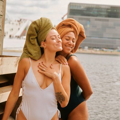 KOK Sauna in Oslo - two ladies in bathing suits outside a sauna in Oslo